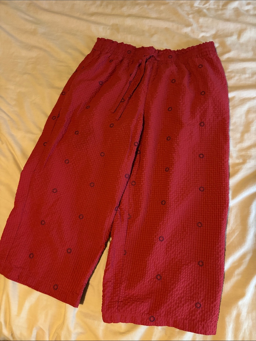 Women's wide leg pants with embroidered suns